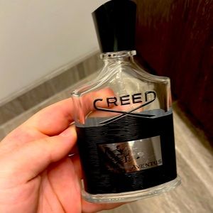 Empty Creed Aventus cologne bottle
